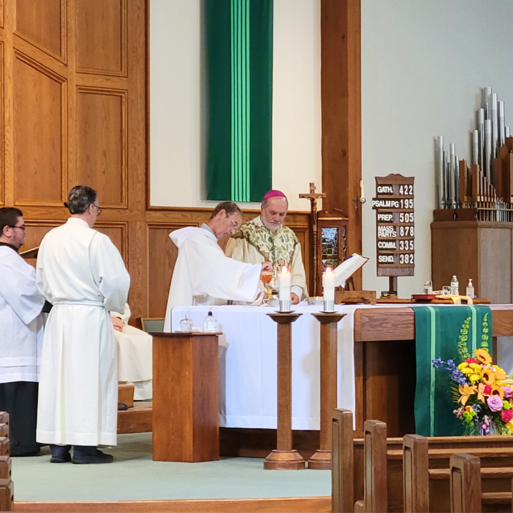 Bishop da Cunha celebrating Mass