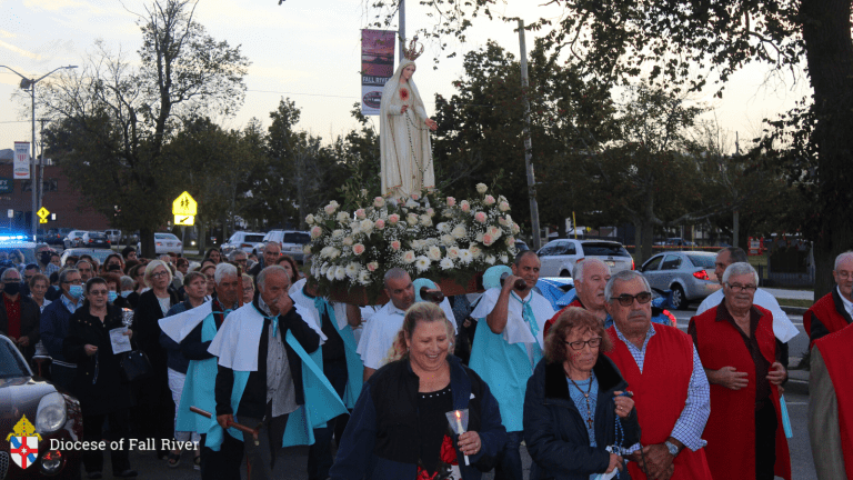 Procession of People Praying for Peace carrying Fatima Statute of Mary